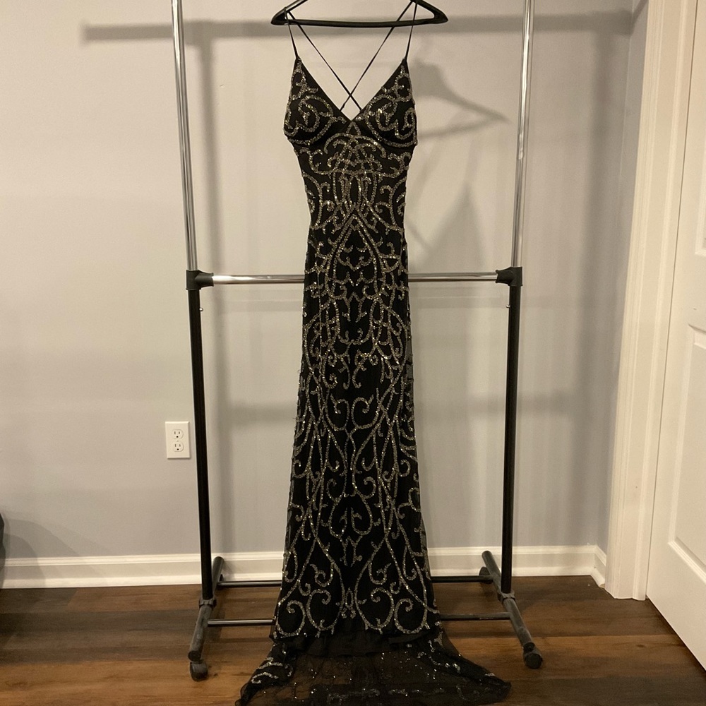 Black formal dress with intricate beed work. Perfect for prom